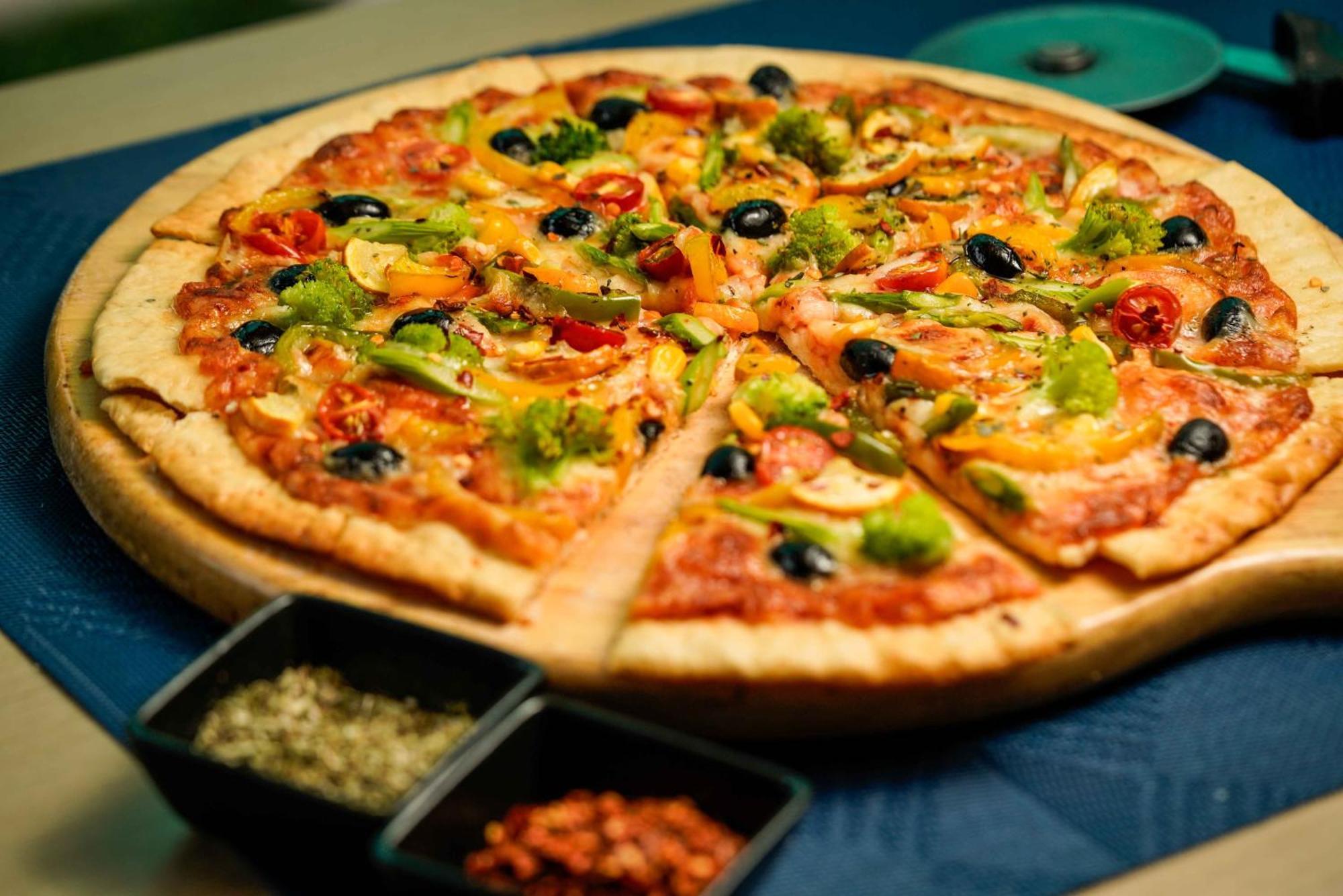 Novotel Kolkata Hotel And Residences Luaran gambar Pizza